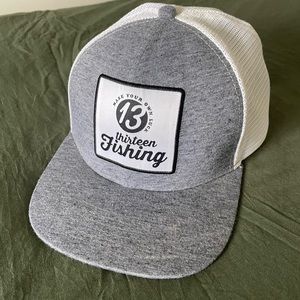 Thirteen Fishing trucker hat